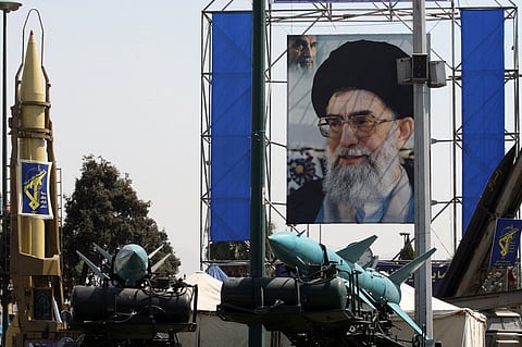In front of a large portrait of Iran's supreme leader Ayatollah Ali Khamenei, Iran's surface-to-surface Shahab-2 (L) and two Sayyad-1 surface-to-air missiles (C) and Zelzal (R) missile are on display on September 26, 2007, in a square south of Tehran.
