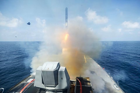 In this US Navy photo released on February 28, 2026 released by the US Central Command shows the Arleigh Burke class guided-missile-destroyer, USS Spruance (DDG 111), firing Tomahawk Land Attack Missiles in support of Operation Epic Fury, from an undisclosed location on February 28, 2026.