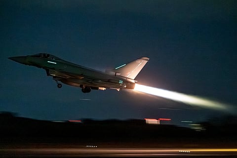 A handout picture taken on March 1, 2026 at the Royal Air Force (RAF) base in Akrotiri in Cyrpus and released by the British Ministry of Defence (MOD) on March 3, 2026 shows an RAF Typhoon aircraft from Britain's Royal Air Force (RAF) taking off for operations across the Middle East.