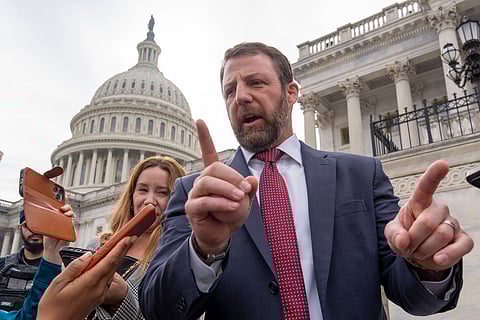 Sen. Markwayne Mullin speaks with reporters on the steps at the Capitol in Washington, Thursday, March 5, 2026.