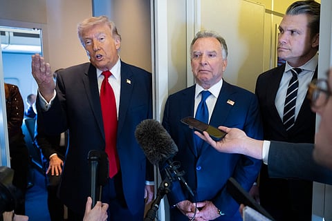 President Donald Trump speaks to members of the media traveling on Air Force One while heading to Miami on March 7, 2026 as United States Special Envoy to the Middle East Steve Witkoff and US Secretary of War Pete Hegseth listen in.