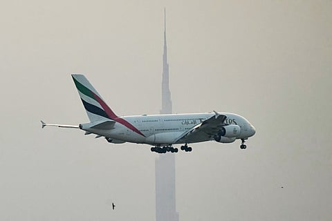 An Emirates Airbus A380 passenger aircraft prepares for landing at Dubai International Airport in Dubai. File photo taken on March 8, 2026.