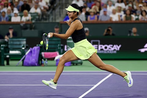 Alexandra Eala of the Phiippines plays a forehand against Coco Gauff of the United States in their third round match of the BNP Paribas Open at Indian Wells Tennis Garden
