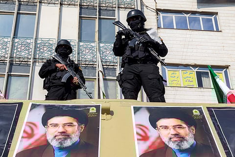 Security forces deploy to guard a rally in support of Iran's new supreme leader Mojtaba Khamenei in Tehran on Monday.