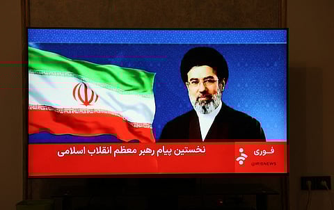 This photo taken in Tehran shows a statement by Iran's new supreme leader Mojtaba Khamenei being televised on March 12, 2026.