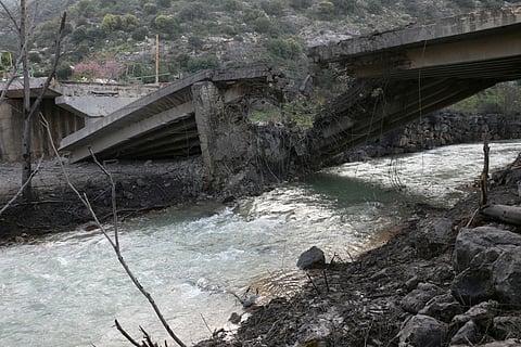 A picture shows the destroyed Tayr Filsay bridge connecting the villages located south of the Litani with those on the northern side of the river after it was targeted by an Israeli air strike on March 13, 2026.