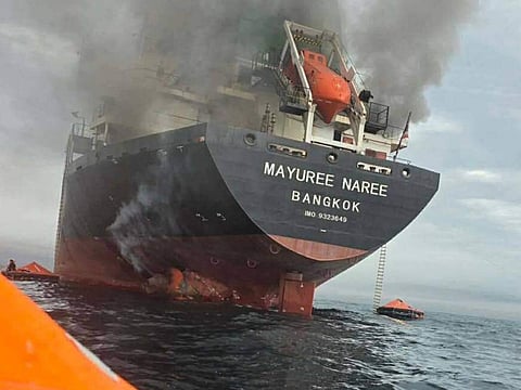 This image shows Thai cargo ship, Mayuree Naree, that was struck and set ablaze in the Strait of Hormuz on Wednesday, March 11, 2026.