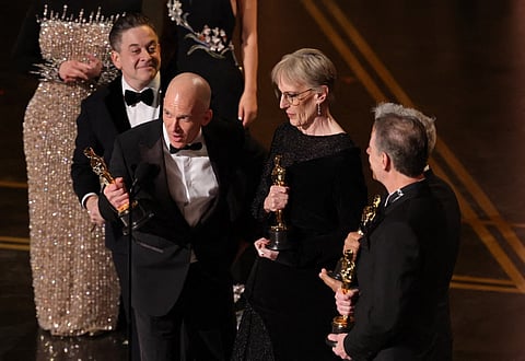 Gary A. Rizzo, Gareth John, Gwendolyn Yates Whittle, Al Nelson, and Juan Peralta accept the Sound award for "F1: The Movie" onstage during the 98th Oscars at Dolby Theatre on March 15, 2026 in Hollywood, California.