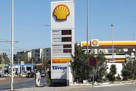 Fuel prices are displayed at a petrol station in Rabat on March 16, 2026, as prices hiked up in Morocco amid geopolitical tensions in the Middle East disrupting the global oil market.