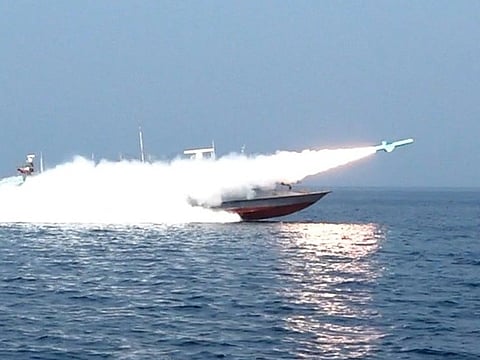 This handout photo released by Iran's Revolutionary Guards Corps (IRGC)'s official website Sepanews on February 17, 2026, shows a rocket being fired from a boat during a military exercise by members of the IRGC and navy in the Strait of Hormuz.