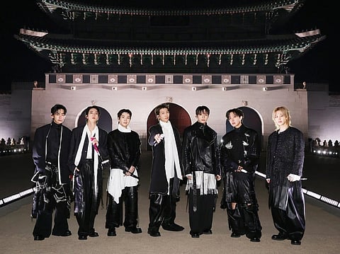 This handout photo taken on March 21, 2026 and provided by BIGHIT MUSIC / Netflix shows K-pop boy group BTS posing for their concert at Gwanghwamun Square in Seoul.