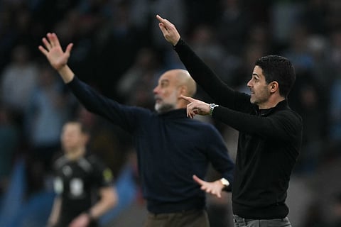 Manchester City's Spanish manager Pep Guardiola (L) and Arsenal's Spanish manager Mikel Arteta (R) gesture on the touchline during the English League Cup final football match between ArsenaPredictionsl and Manchester City at Wembley Stadium in London on March 22, 2026.