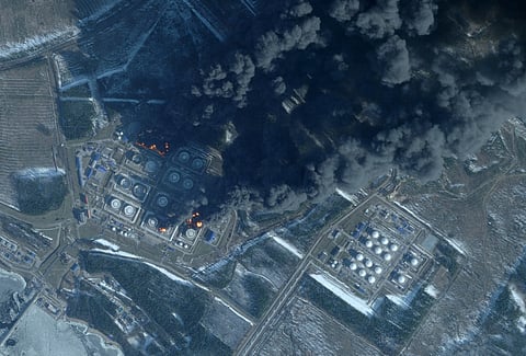 This handout satellite image taken on March 23, 2026 by Planet Labs PBC shows smoke rising from the Russian oil terminal at Primorsk, the most important Russian loading port in the Baltic Sea, following a drone attack claimed by Ukraine