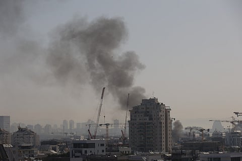 Smoke rises from an Iranian missile strike in Tel Aviv. File photo taken on March 23, 2026. For illustrative purposes only.