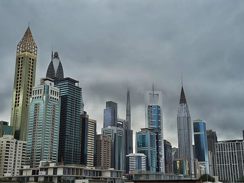 Clouds over Dubai skyline.