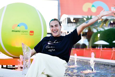 Aryna Sabalenka poses with the Butch Buchholz trophy after defeating Coco Gauff of the United States during the Women's Singles Final on Day 12 of the Miami Open Presented by Itau at Hard Rock Stadium on March 28, 2026 in Miami Gardens, Florida.