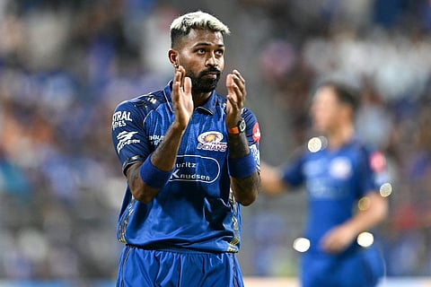 Mumbai Indians' captain Indian cricket player Hardik Pandya gestures before the start of the 2026 Indian Premier League (IPL) T20 match between Mumbai Indians and Kolkata Knight Riders at the Wankhede Stadium in Mumbai on March 29, 2026.