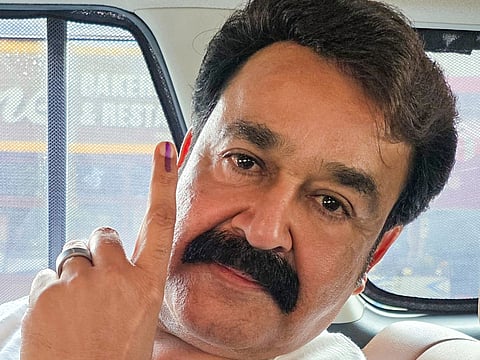 Malayalam film superstar Mohanlal shows his ink-marked finger after casting his vote during the Kerala Assembly election, at Mudavanmugal LPS, in Thiruvananthapuram, Kerala on Thursday, April 9, 2026