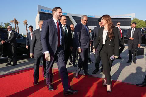 US Vice President JD Vance (fourth left) walks with Pakistani Deputy Prime Minister and Foreign Minister Mohammad Ishaq Dar (third left), Pakistan's Chief of Defence Forces and Chief of Army Staff Field Marshall Asim Munir (centre left), Pakistan's Interior Minister Mohsin Naqvi (centre right), and Charge d'Affaires of the US Embassy in Islamabad Natalie A. Baker (3rd R) before boarding Air Force Two after attending talks on Iran in Islamabad on April 12, 2026.