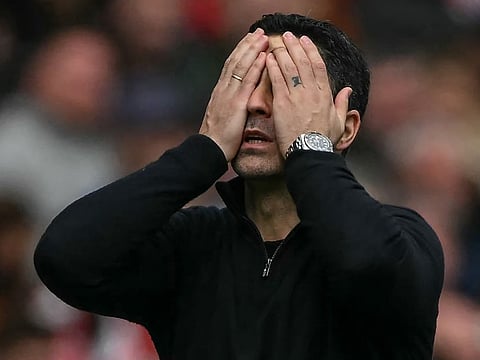Mikel Arteta reacts to Alex Scott's winner as his side drop points in the Premier League title race