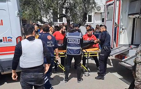 First aid officers carrying a body bag in Kahramanmaras, southern Turkey.