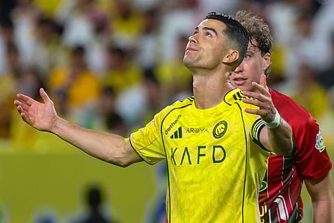 Nassr's Portuguese forward #07 Cristiano Ronaldo reacts during the Saudi Pro League football match between Al-Nassr and Al-Ettifaq at the Al-Awwal Park Stadium in Riyadh on April 15, 2026.