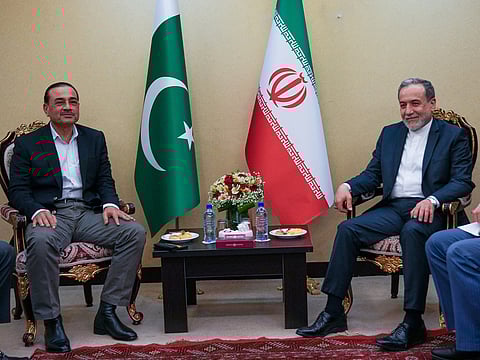 Iranian Foreign Minister Abbas Araghchi, right, meets with Pakistan's Army Chief Field Marshal Gen. Asim Munir in Tehran, Wednesday, April 15, 2026.
