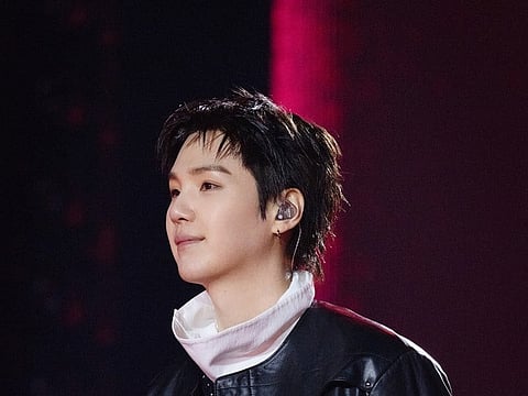 BTS member Suga performing during their comeback concert at the Gwanghwamun Square in Seoul.