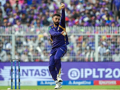 Kolkata Knight Riders' Varun Chakaravarthy bowls during the Indian Premier League 2026 match against Rajasthan Royals, at Eden Gardens, in Kolkata on Sunday.