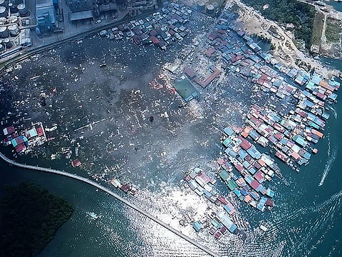 Kampung Bahagia water village after a fire, in Sandakan, on Malaysia’s Borneo island.