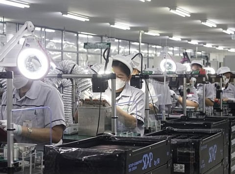 Workers at an electronics factory in the Philippines. While alliances shift, national interest stays the same. Policiymakers should adopt strategies that create jobs, improve efficiency, build skills, strengthen supply chains, and raise competitiveness.