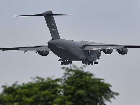 A US Air Force Boeing C-17 Globemaster III transport aircraft prepares to land at Nur Khan airbase, ahead of second round of negotiations between the US and Iran, in Rawalpindi, Pakistan, Monday, April 20, 2026.