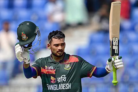 Bangladesh's Najmul Hossain Shanto celebrates after scoring a century during the third ODI against New Zealand at the Bir Sreshtho Flight Lieutenant Matiur Rahman Stadium in Chittagong on April 23, 2026.