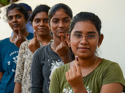 Voters show their ink-marked fingers after casting their vote during the 2026 Tamil Nadu Legislative Assembly elections in Chennai district of Tamil Nadu on Thursday, April 23, 2026.