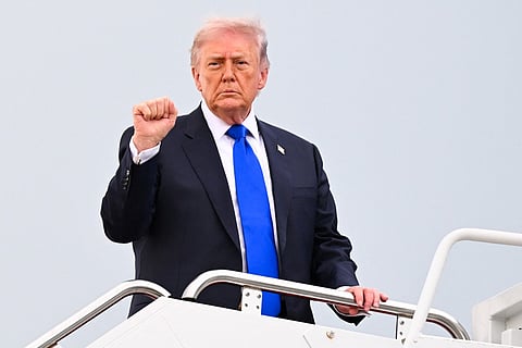 President Donald Trump boards Air Force One on April 24, 2026 at Joint Base Andrews, Maryland.