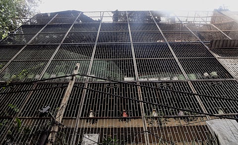 A view of the four-storey residential building in the Vivek Vihar area after a massive fire breaks out resulting in nine deaths and some injuries, in New Delhi on Sunday.