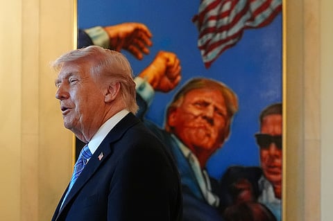 President Donald Trump talks with small business owners in the Grand Foyer of the White House, Monday, May 4, 2026, in Washington.