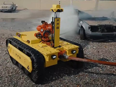 Robotic firefighting units deployed by Sharjah Civil Defence during industrial fire response operations.
