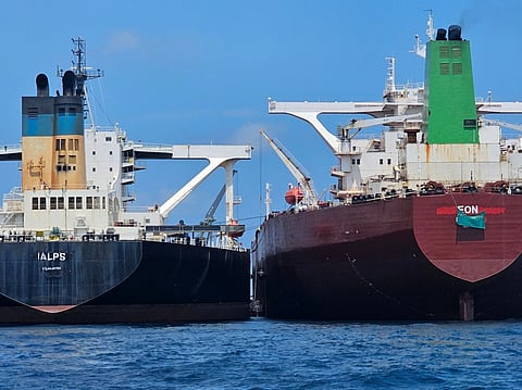 This handout photo from United Against Nuclear Iran shows two oil tankers making a ship-to-ship transfer of Iranian oil in the Eastern Outer Port Limits (EOPL), 70 kilometers off Malaysia.