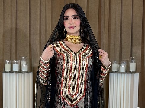 The Mukhawar is a full-length Emirati jalabiya celebrated for its hand-crafted embroidery and rich fabrics