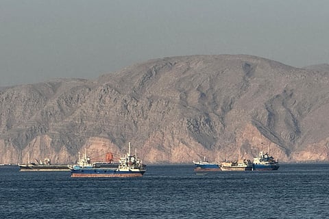 Vessels anchored in the Strait of Hormuz, off the port city of Khasab on Oman’s northern Musandam Peninsula on May 17, 2026.