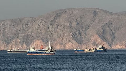 Ships at Anchor in the Strait of Hormuz, off Oman's northern coast.