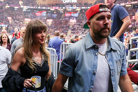 Singer Taylor Swift and Travis Kelce of the Kansas City Chiefs attend Game Three between the New York Knicks and the Cleveland Cavaliers in the NBA Eastern Conference Finals at Rocket Arena on May 23, 2026 in Cleveland, Ohio.