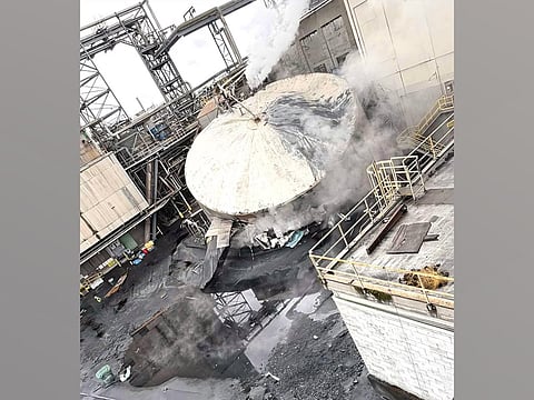 A photo obtained by the Cowlitz County News, a Facebook page run by local citizens, shows the aftermath of a tank rupture at Nippon Dynawave Packaging in Longview, Washington, May 26, 2026.