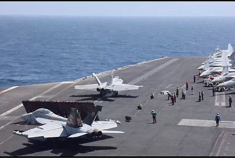 USS Abraham Lincoln (CVN 72) conducts flight operations while transiting the Arabian Sea. Sailors and Marines aboard the aircraft carrier perform their tasks in support of US military operations across the Middle East.