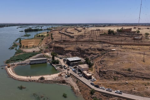 This aerial photograph shows flood waters along the water stations in Syria's Deir Ezzor province on May 31, 2026, following recent flooding as water levels from the Euphrates river rise.