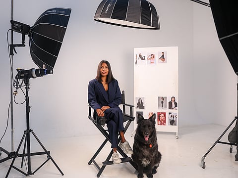 Candace Braganza, Founder of Sculpt25 Creative, with her pet dog Darko.