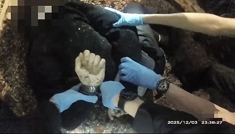 This screen grab from bodycam video taken on December 3, 2025 and released by Hampshire & Isle of Wight Constabulary to AFP on June 2, 2026 shows 18-year-old student Henry Nowak being handcuffed by police before his death, following a false claim of racial abuse, in Southampton, south England.