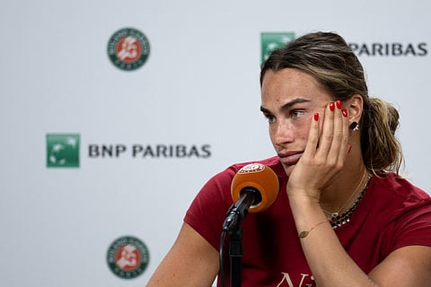 Aryna Sabalenka reacts during a press conference after being defeated by Diana Shnaider during their women's quarter final singles match on day 11 of the French Open tennis tournament on Court Philippe-Chatrier at the Roland-Garros Complex in Paris on June 3, 2026.