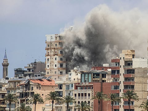 Smoke rises following an Israeli airstrike on the southern city of Tyre on June 9, 2026..